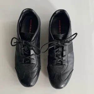 Black lace up Prada mens sneakers.
